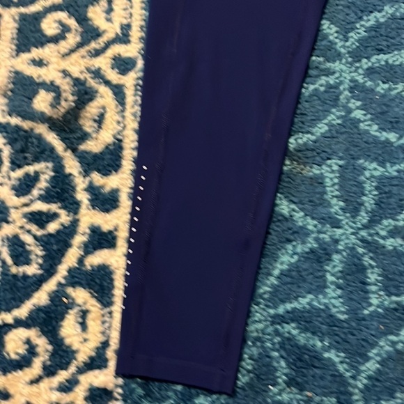 NWT leggings with tapered legs and side pockets. Bonus zippered pocket waistband - Picture 2 of 3